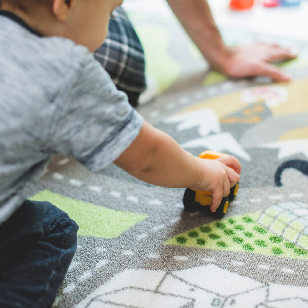 wooden toy blocks on wooden table in the Children's room.